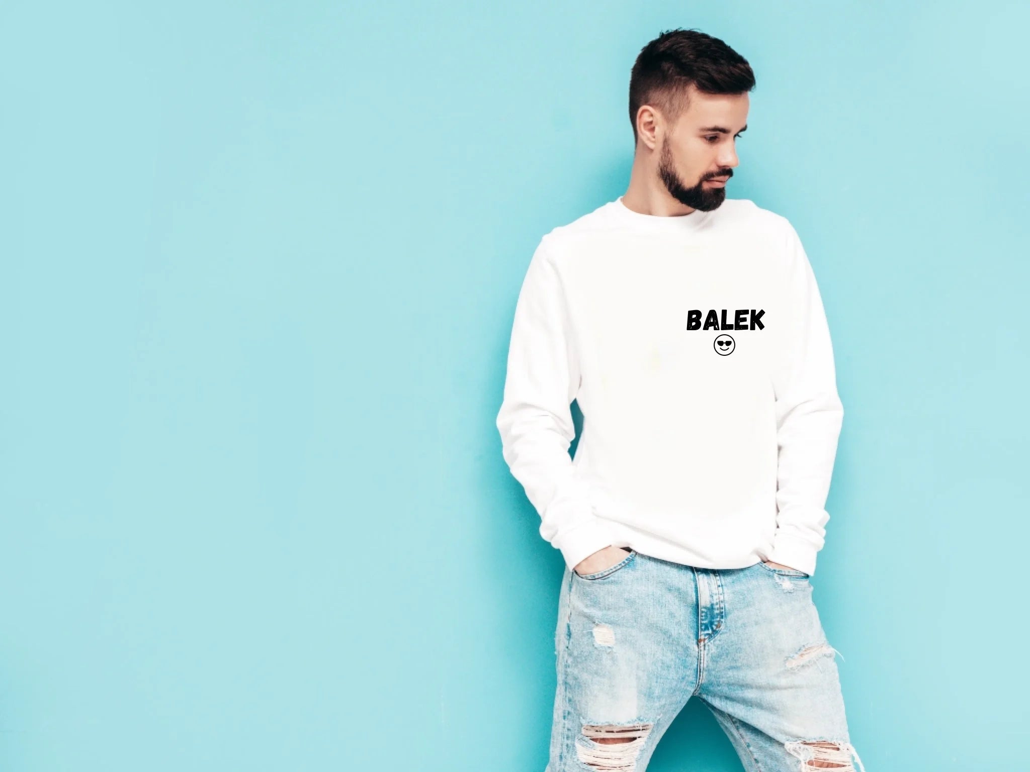 portrait-handsome-confident-stylish-hipster-lambersexual-modelman-dressed-white-sweater-jeans-fashion-male-isolated-blue-wall-studio